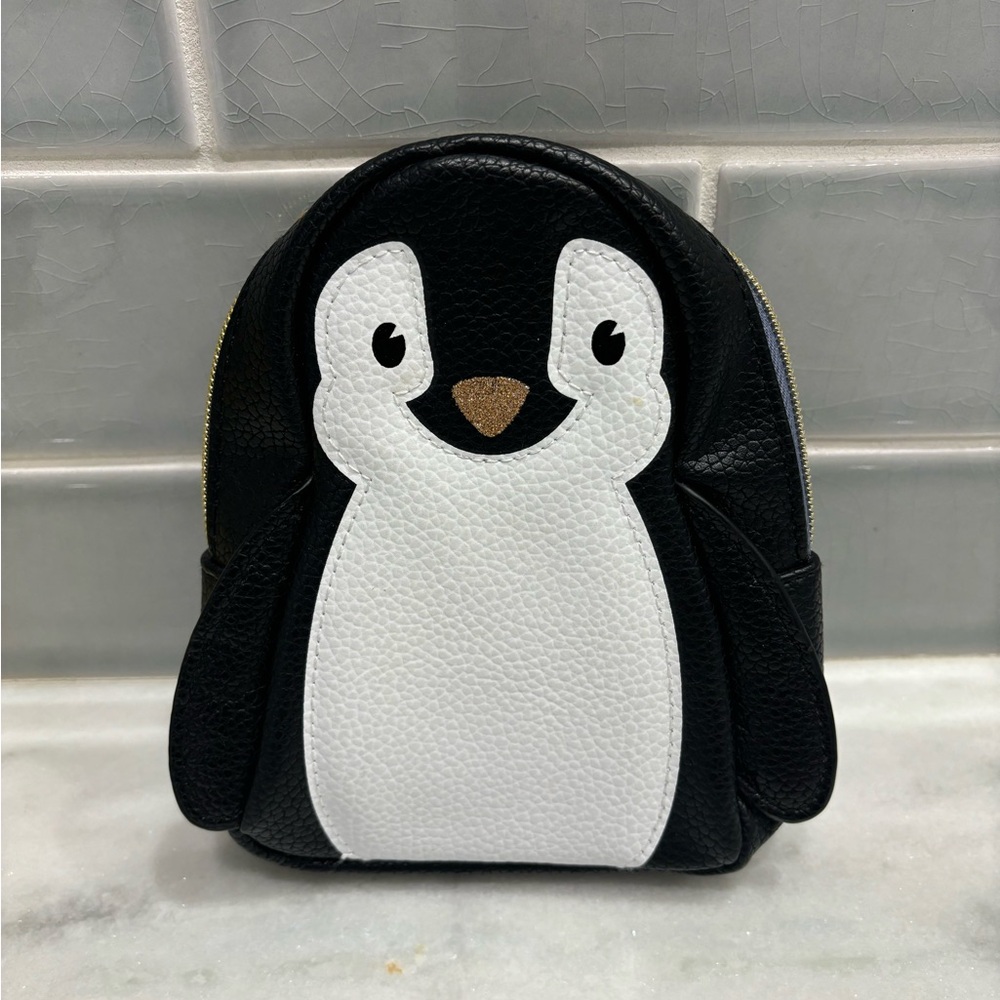 Bath & Body Works penguin cosmetic bag in black and white faux leather